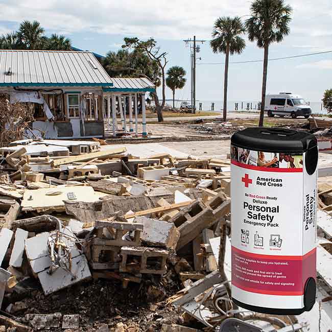 The Deluxe Personal Safety Emergency Pack and an image of a home affected by a disaster.