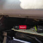 Sawyer Mini Water Filter installed in glove box as part of an outdoor emergency water filtration setup.