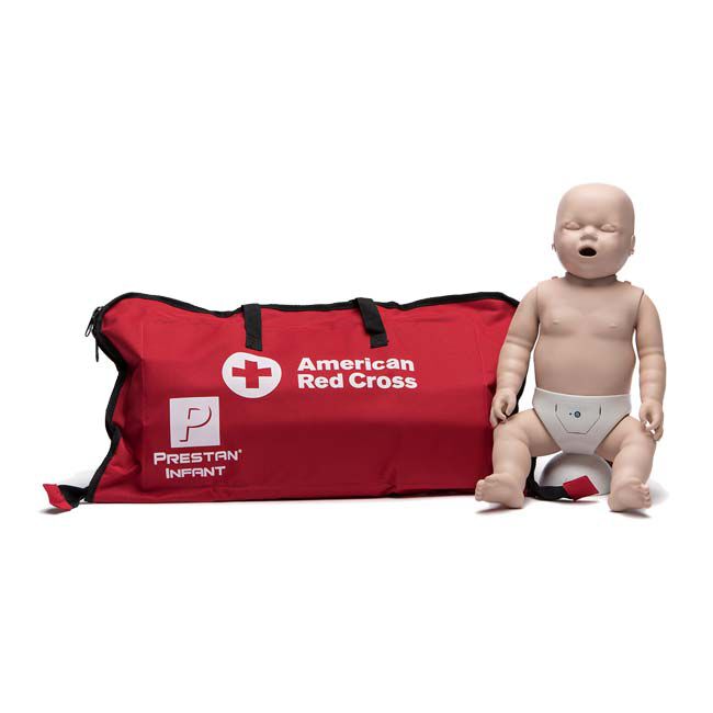 Prestan Infant Manikin with CPR Monitor sitting upright next to an American Red Cross carrying bag.