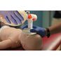 Closeup view of the Ambu SPUR II Infant Bag Valve Mask being used on an infant CPR manikin.
