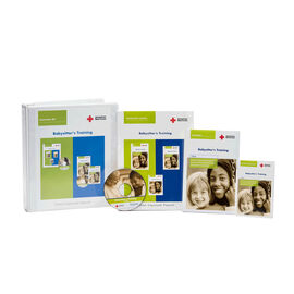 The American Red Cross Babysitter's Training Instructor Kit binder, DVD, Instructor's Manual, Handbook, and Emergency Reference Guide featuring a woman babysitter and young girl.