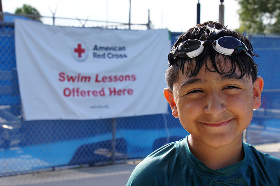 One child learning to swim at Red Cross swim lesson
